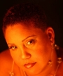 Denise \"Saucy Wow\" Belfon